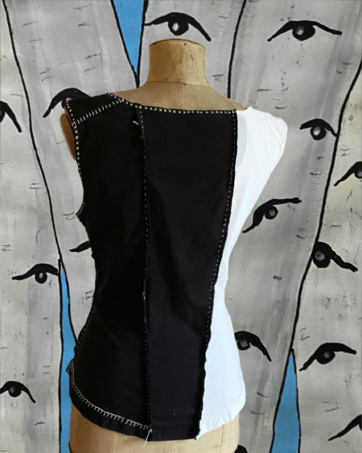 Back of black and white top made of 3 old t-shirts