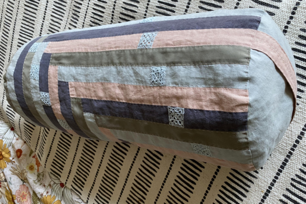 patchwork cover for yoga bolster in rose lightblue darkblue and olive with mini grannies
