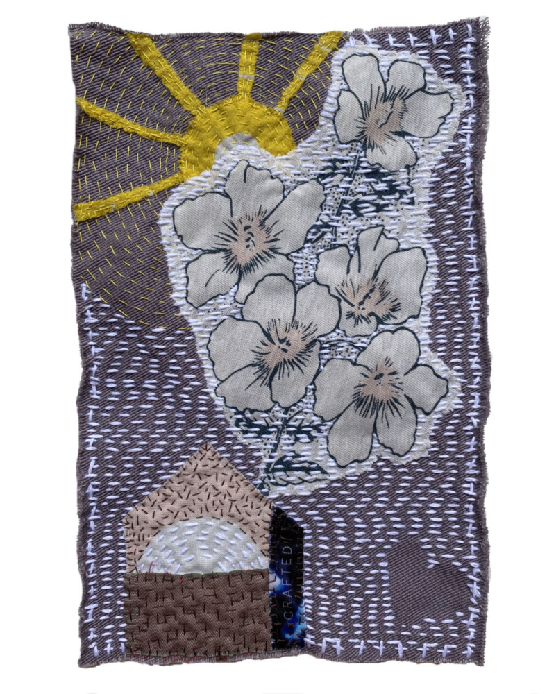 patch with embroidered house, flowers and sun