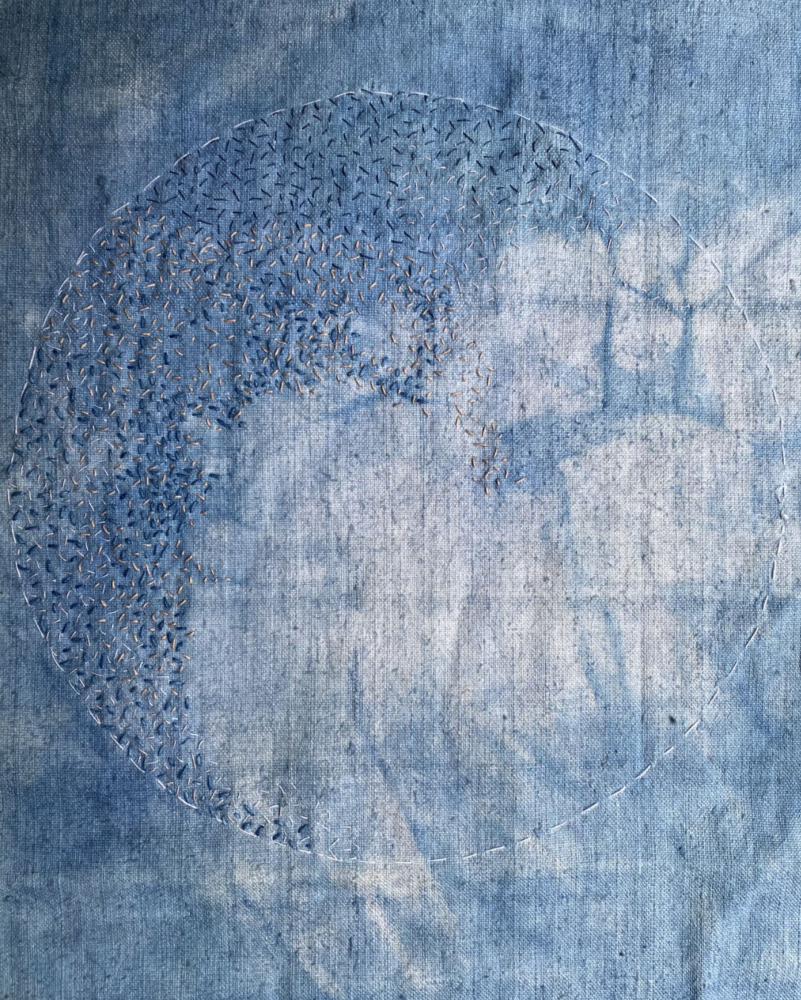 rose and blue seed stitch on indigo batik