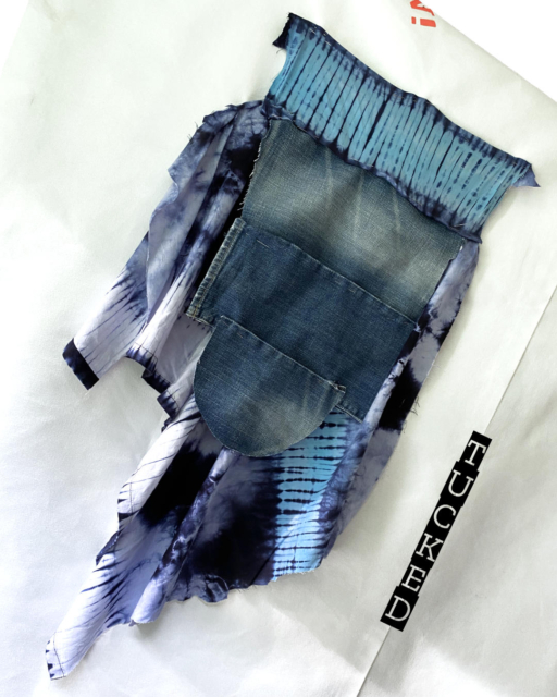 back skirt part of dress with jeans train tucked