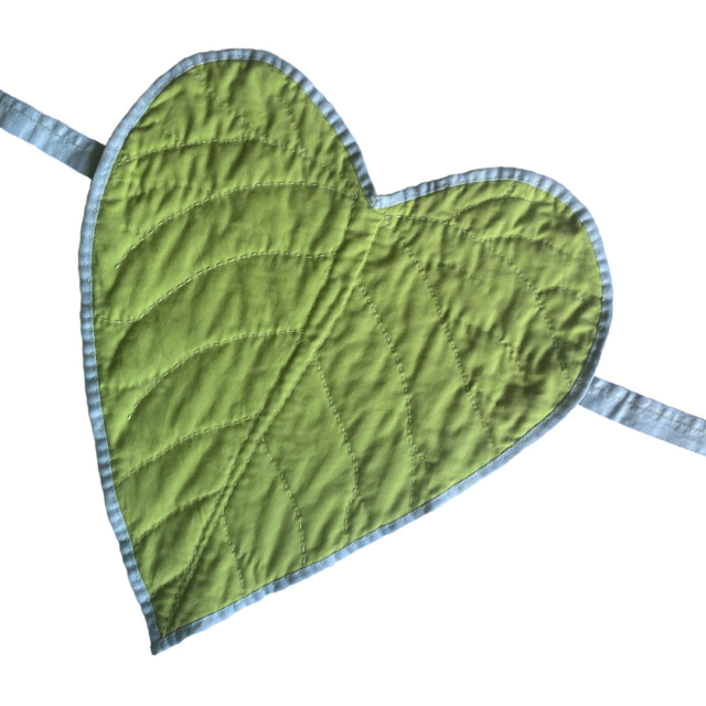 green quilted leaf heart with light blue border and bands