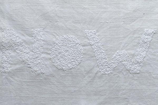 NOW stitched white on on white linen
